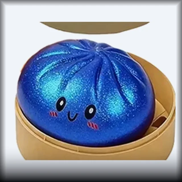 Squishy bao bleu nuit constellé de paillettes, dans son mini panier vapeur